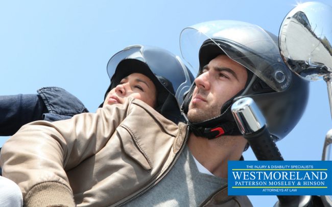 Couple on motorcycle injured in hit-and-run